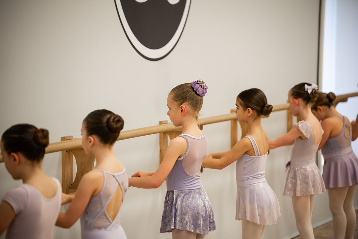 students training on ballet bar